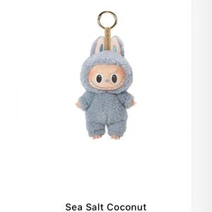 Exciting Macaron Sea Salt Coconut Plush Pendant. Newer version comes in dust bag